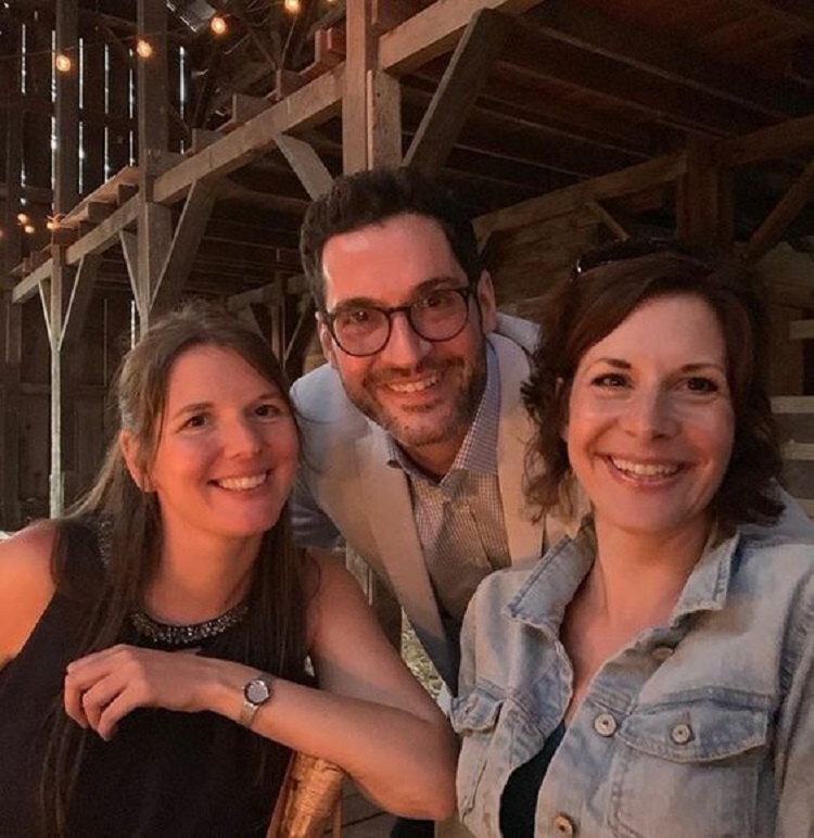 Tom Ellis with his twin sister and older sister.