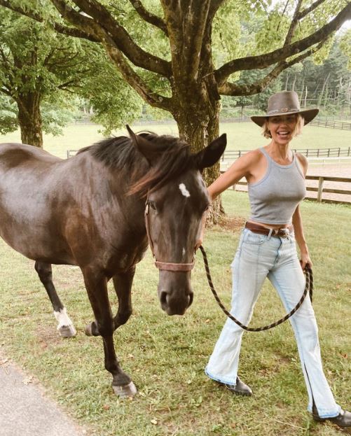 Arielle Kebbel riding her pet horse